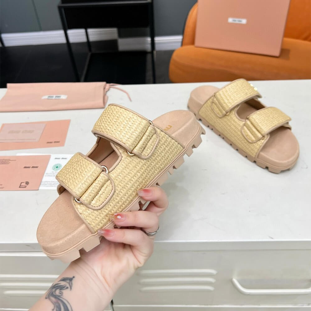MiuMiu Raffia-effect woven fabric slides